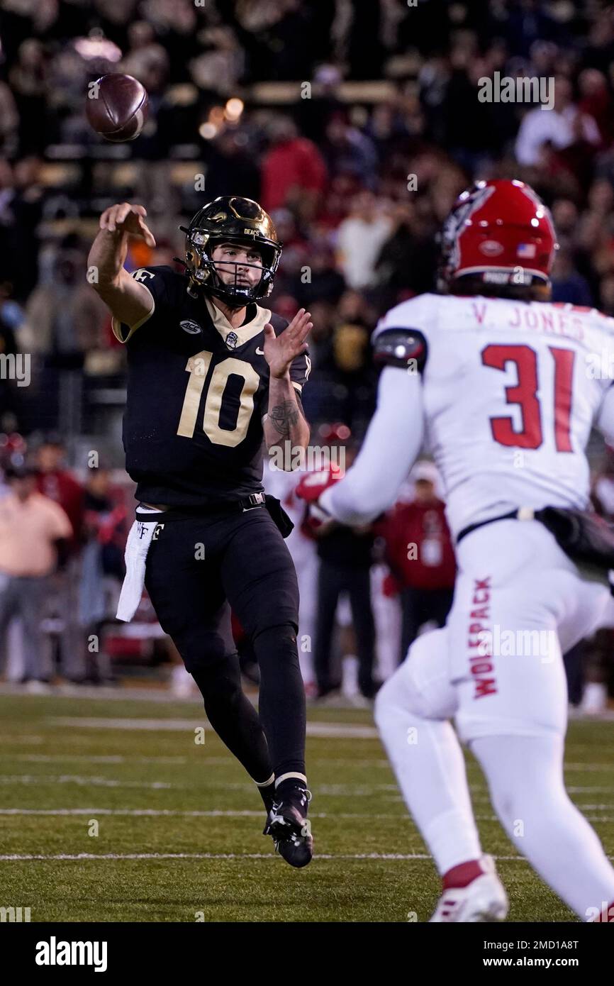 Wake Forest quarterback Sam Hartman passes for a touchdown during the