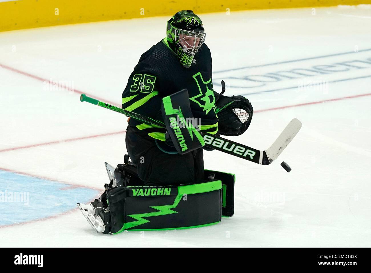 Dallas Stars goaltender Anton Khudobin (35) deflects a shot during the second period of an NHL hockey game against the Philadelphia Flyers in Dallas, Saturday, Nov. 13, 2021. (AP Photo/LM Otero) Stock Photo