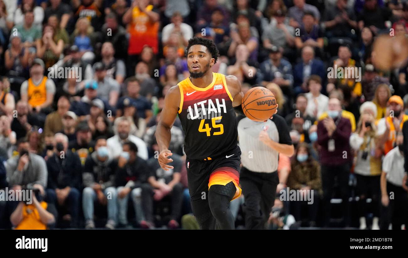 Utah Jazz guard Donovan Mitchell (45) brings the ball up court in the ...