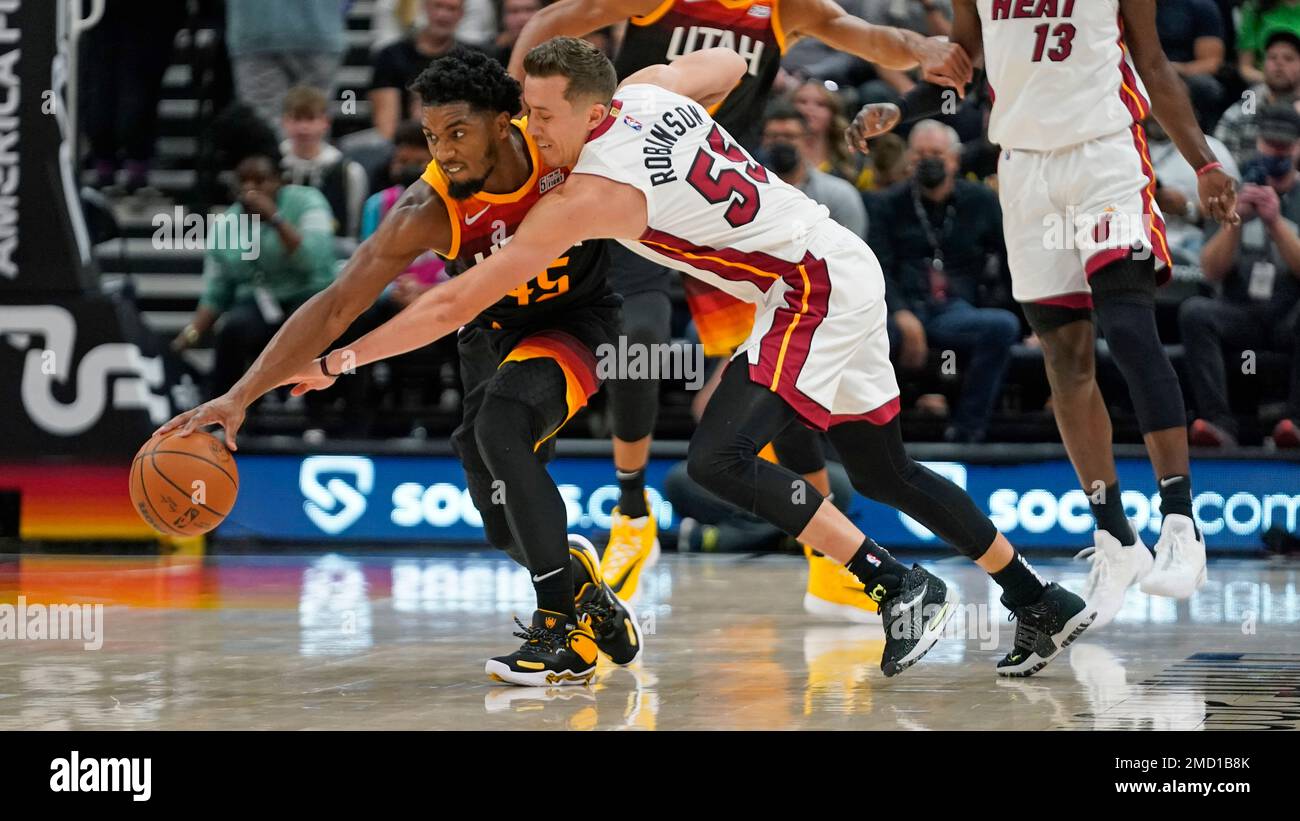 Utah Jazz guard Donovan Mitchell (45) and Miami Heat guard Duncan ...
