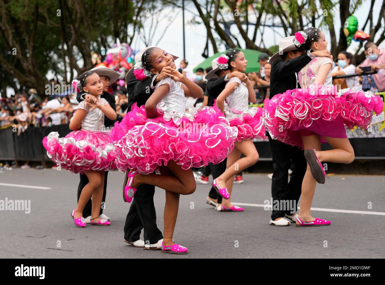 Folk dancers parade during the International Tournament of Joropo, in