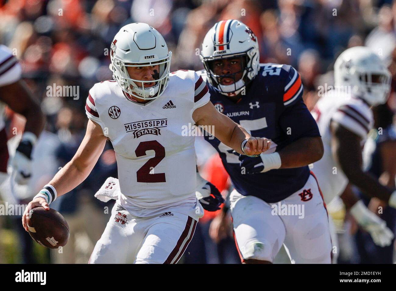 Mississippi State quarterback Will Rogers (2) scrambles away from the ...