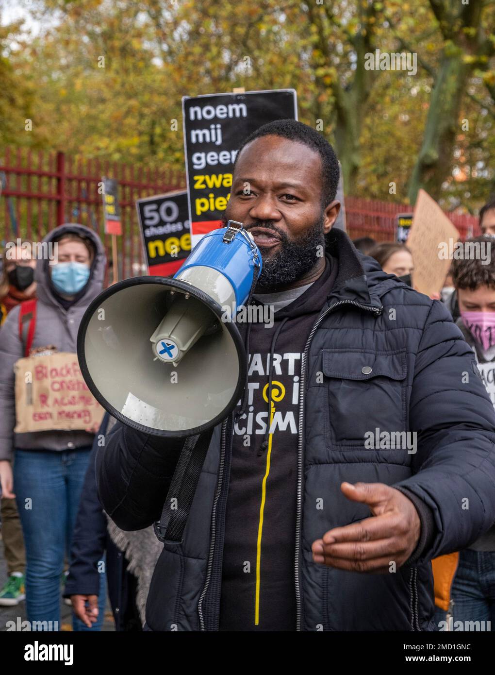 The foreman of action group Kick Out Zwarte Piet, Jerry Afriyie addresses  the bystanders during protest against Black Pete, the traditional helper of  Sinterklaas, the Dutch version of Santa Claus, in Breda,