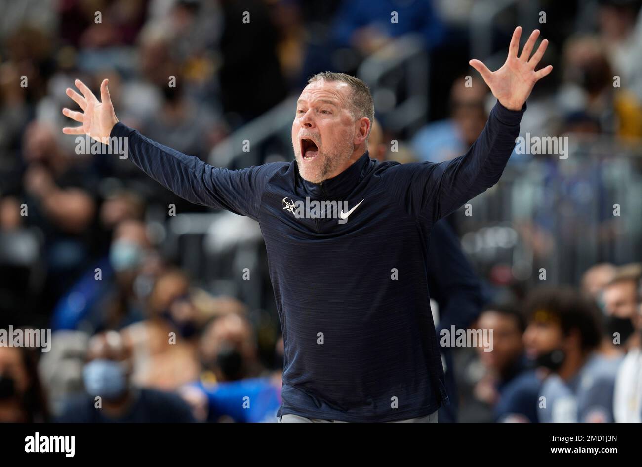 Denver Nuggets coach Michael Malone gestures during the second half of