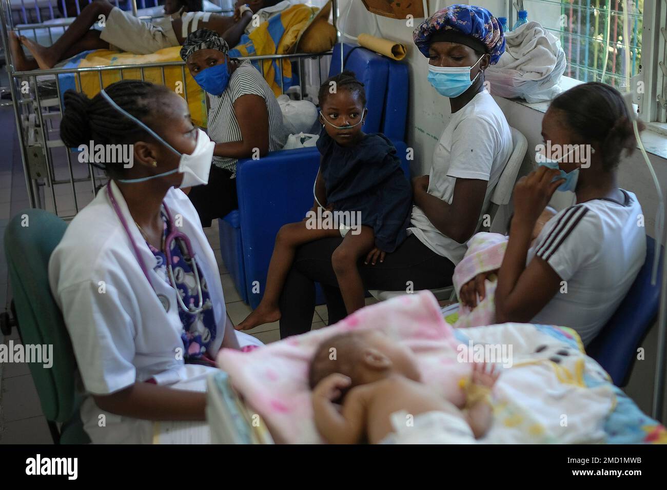 A child receives oxygen at the Saint Damien Pediatric Hospital of Port