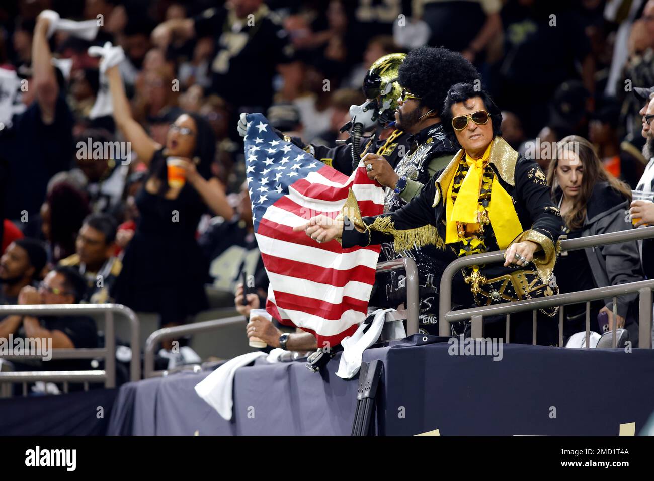 New Orleans Saints vs. Atlanta Falcons. Fans support on NFL Game.  Silhouette of supporters, big screen with two rivals in background Stock  Photo - Alamy