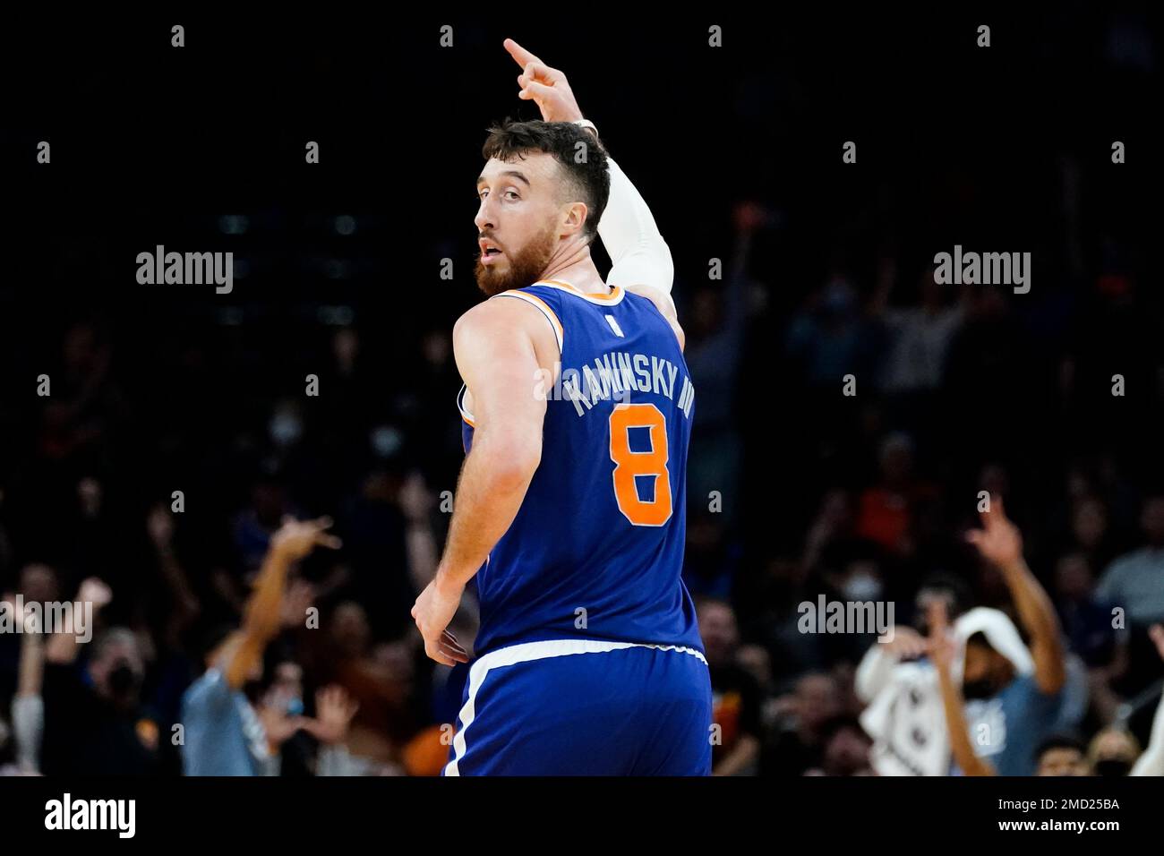Phoenix Suns forward Frank Kaminsky (8) signals three pointer during ...
