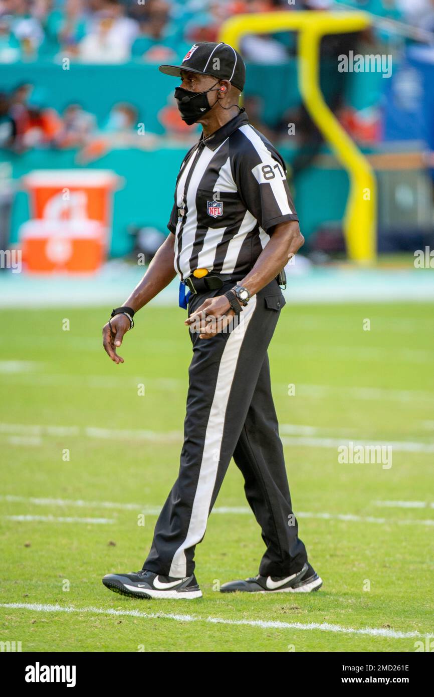 NFL umpire Roy Ellison walks on the field during an NFL football game