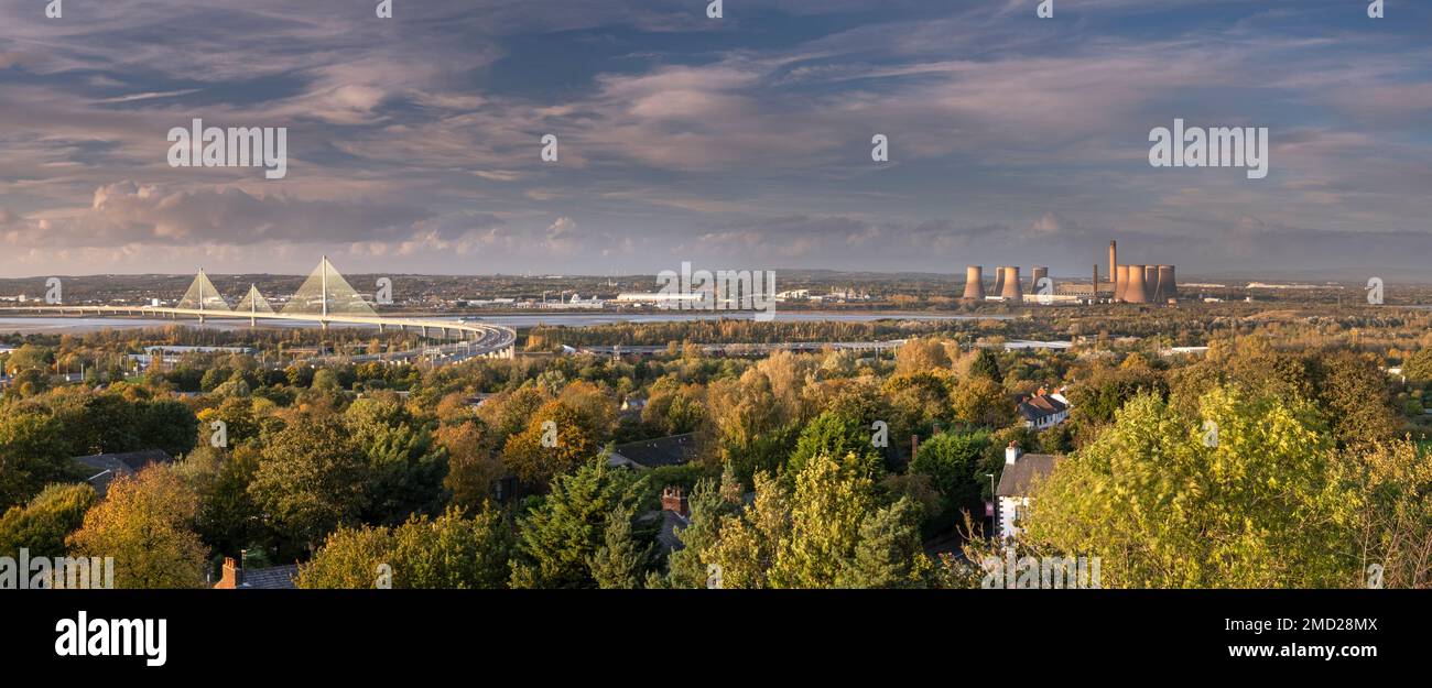 The Mersey Gateway Bridge over the Mersey Estuary and Fiddlers Ferry Power Station in autumn, Runcorn, Cheshire, England, UK Stock Photo