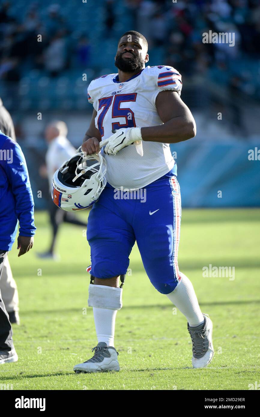 Buffalo Bills offensive tackle Daryl Williams (75) walks off the field  after a loss to the Jacksonville Jaguars during an NFL football game,  Sunday, Nov. 7, 2021, in Jacksonville, Fla. (AP Photo/Phelan