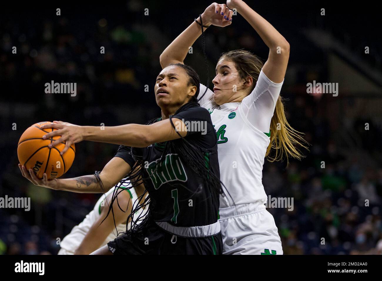 Ohio's Cece Hooks (1) goes up for a shot in front of Notre Dame's Sonia