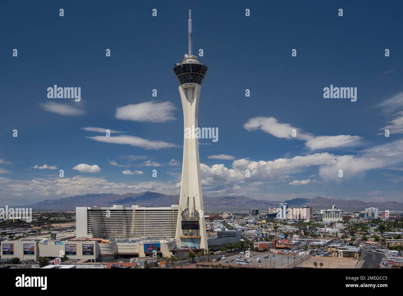 View at the top of the Stratosphere Hotel in Las Vegas, Nevada. The very  top of the tower, the 'Big Shot' ride, is pictured against a blue cloudy  sky. Copy space on