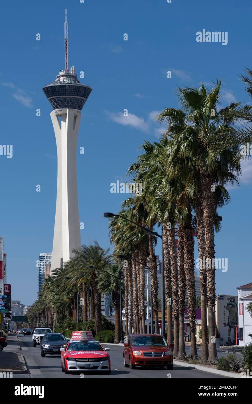 The STRAT Hotel Tower and Traffic on Las Vegas Boulevard, Las Vegas, Nevada, USA Stock Photo