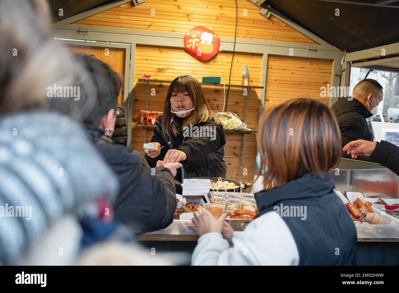 Barcelona Spain 21st Jan 2023 A Woman Serves Traditional Chinese barcelona-spain-21st-jan-2023-a-woman-serves-traditional-chinese