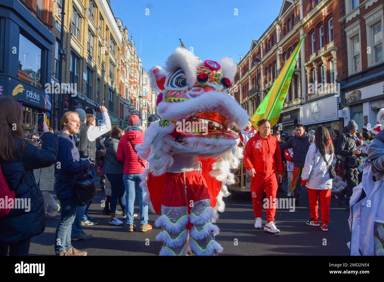 London, UK. 22nd Jan, 2023. Traditional lion dancers entertain the ...