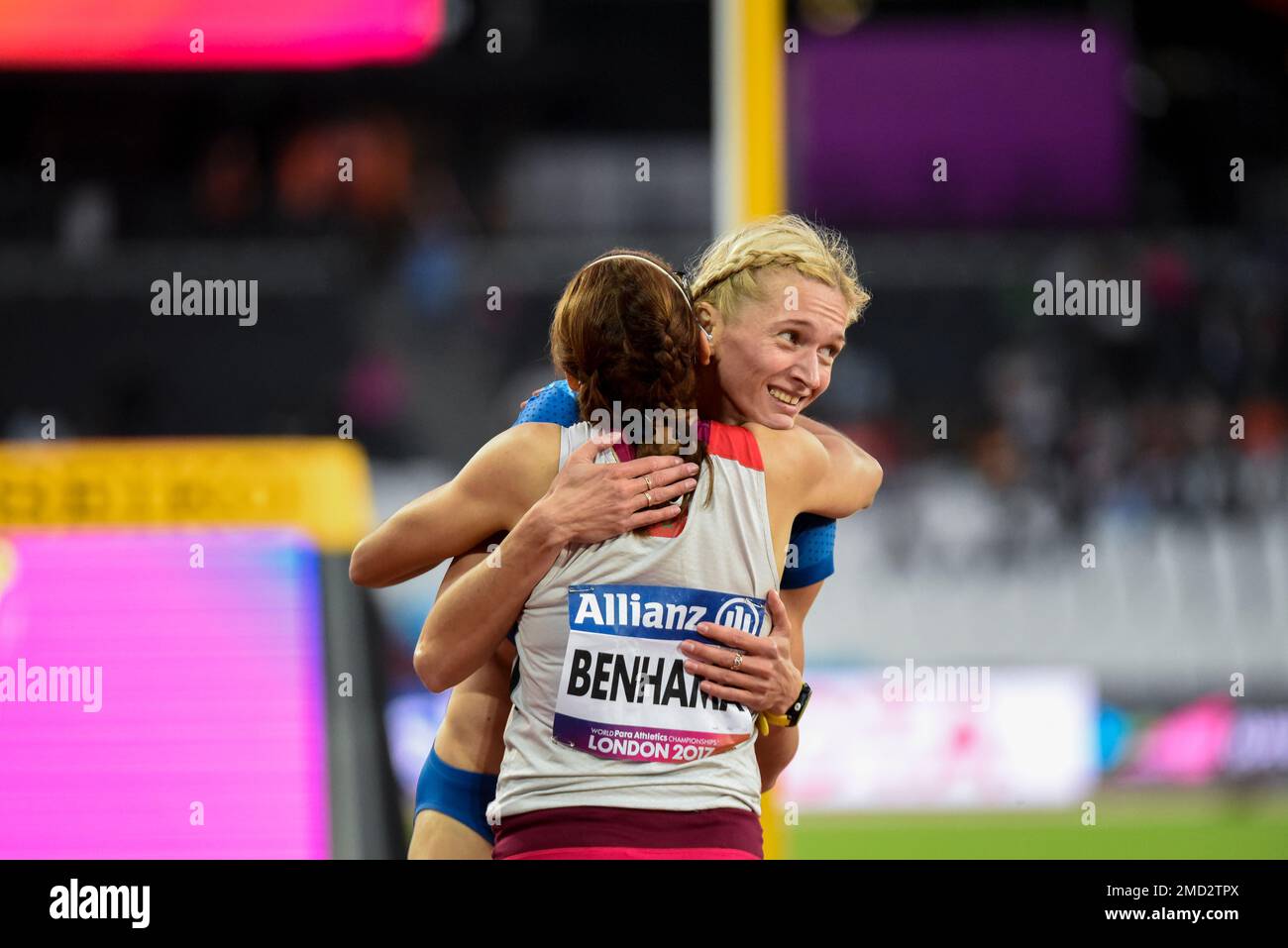 Olena Gliebova hugs Sanaa Benhama at the 2017 World Para Athletics Championships in the Olympic Stadium, London, T13 400m Visually impaired race Stock Photo