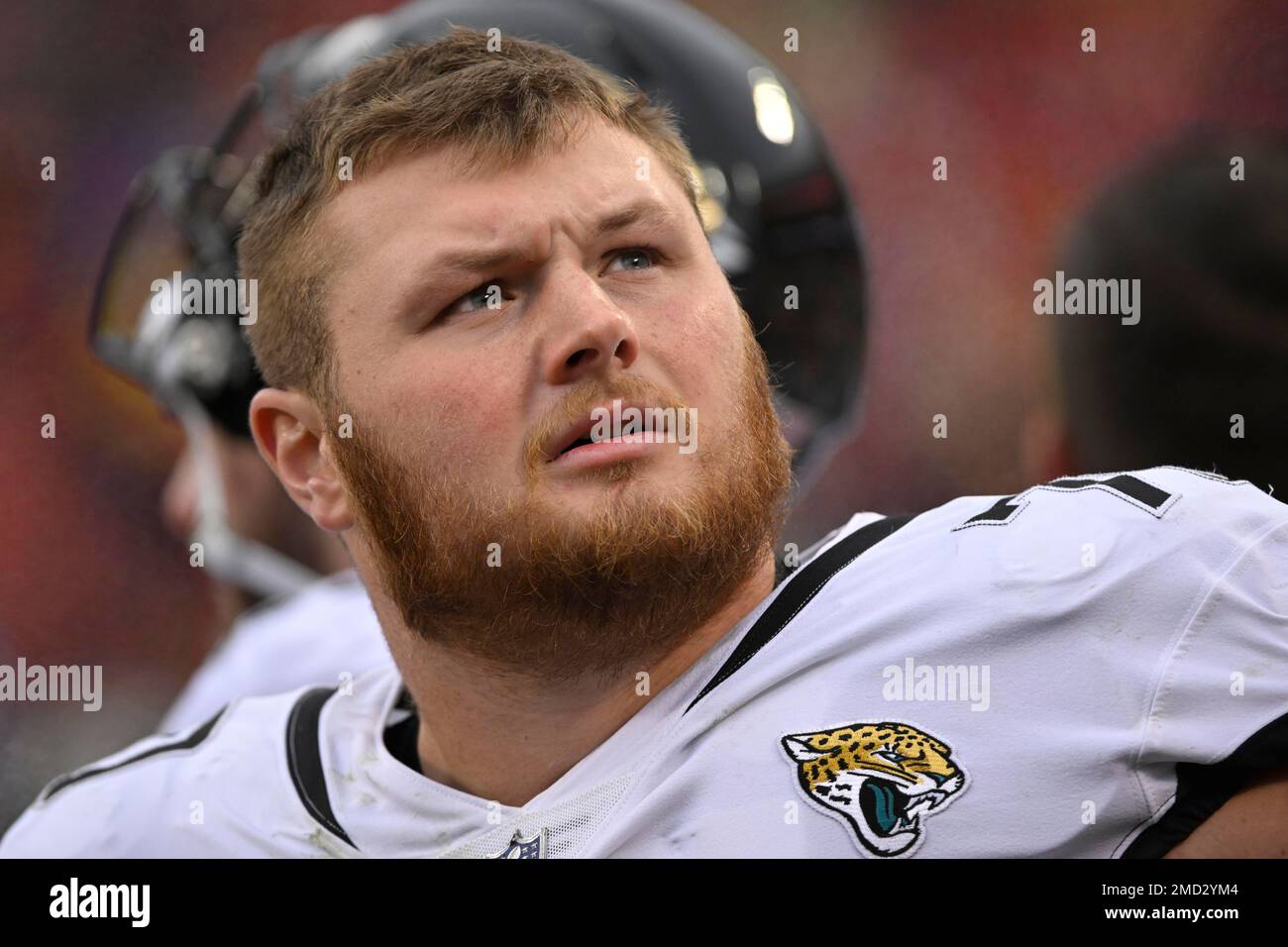 Jacksonville Jaguars offensive tackle Cole Van Lanen looks to the scoreboard  during the first half of an NFL divisional round playoff football game  against the Kansas City Chiefs, Saturday, Jan. 21, 2023