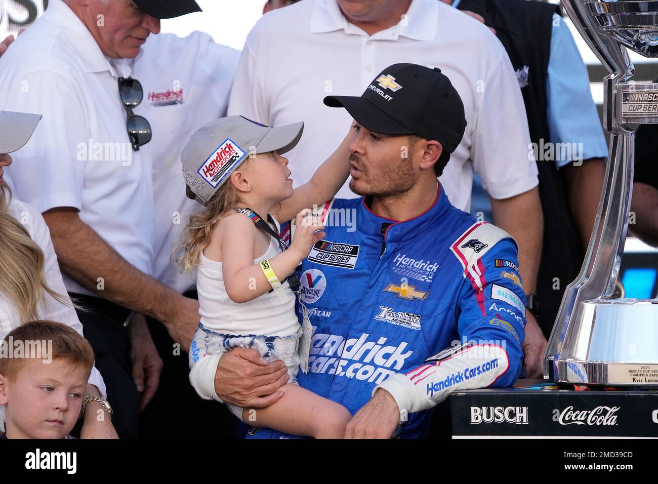Kyle Larson and his daughter Audrey celebrate after winning a NASCAR ...