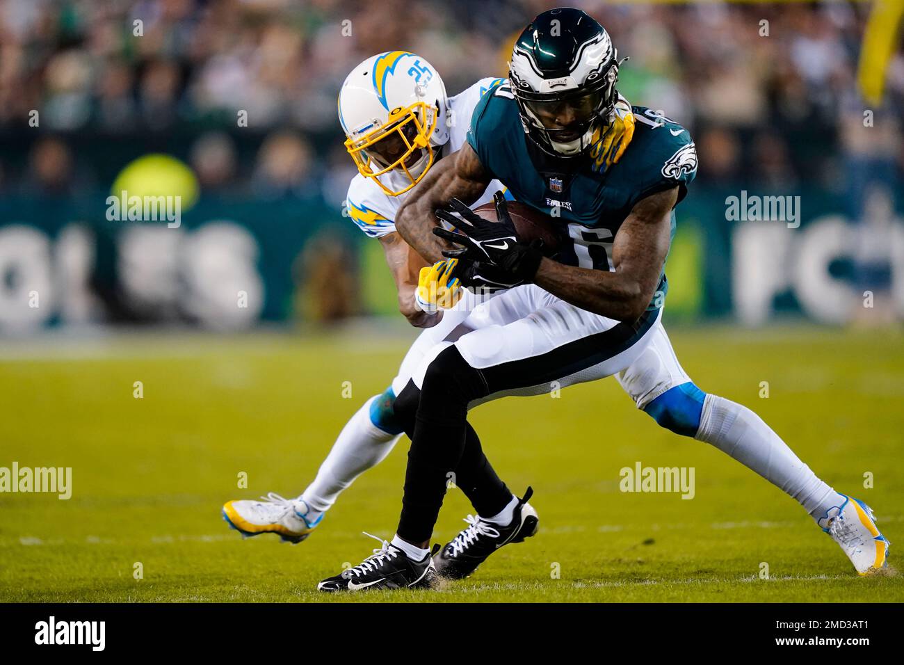 Philadelphia Eagles wide receiver Quez Watkins (16) is brought down by