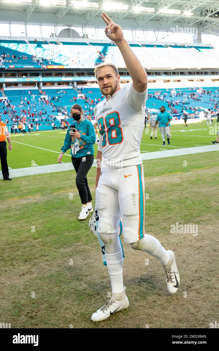 Miami Dolphins tight end Mike Gesicki (88) waves to the fans as he  celebrates the Dolphins defeating the Houston Texans during an NFL football  game, Sunday Nov. 7, 2021, in Miami Gardens,