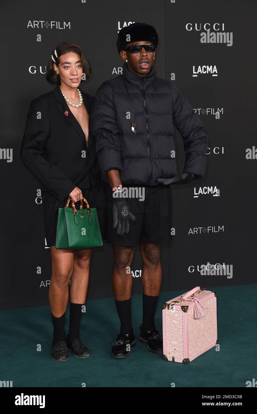 Talent Reign Judge, left, and Tyler the Creator arrive at the LACMA Art