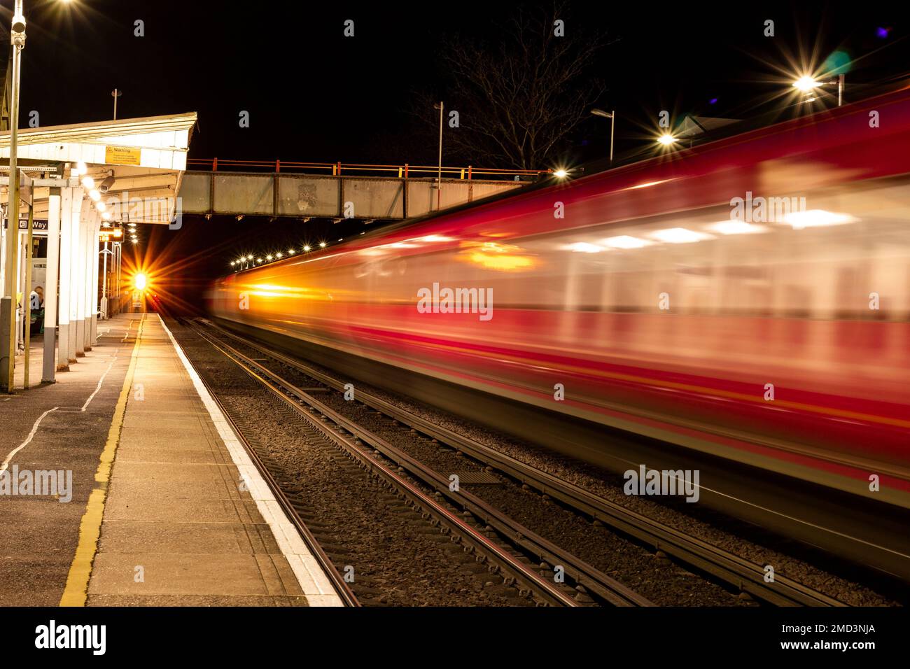 Fast moving train at a station hi-res stock photography and images - Alamy