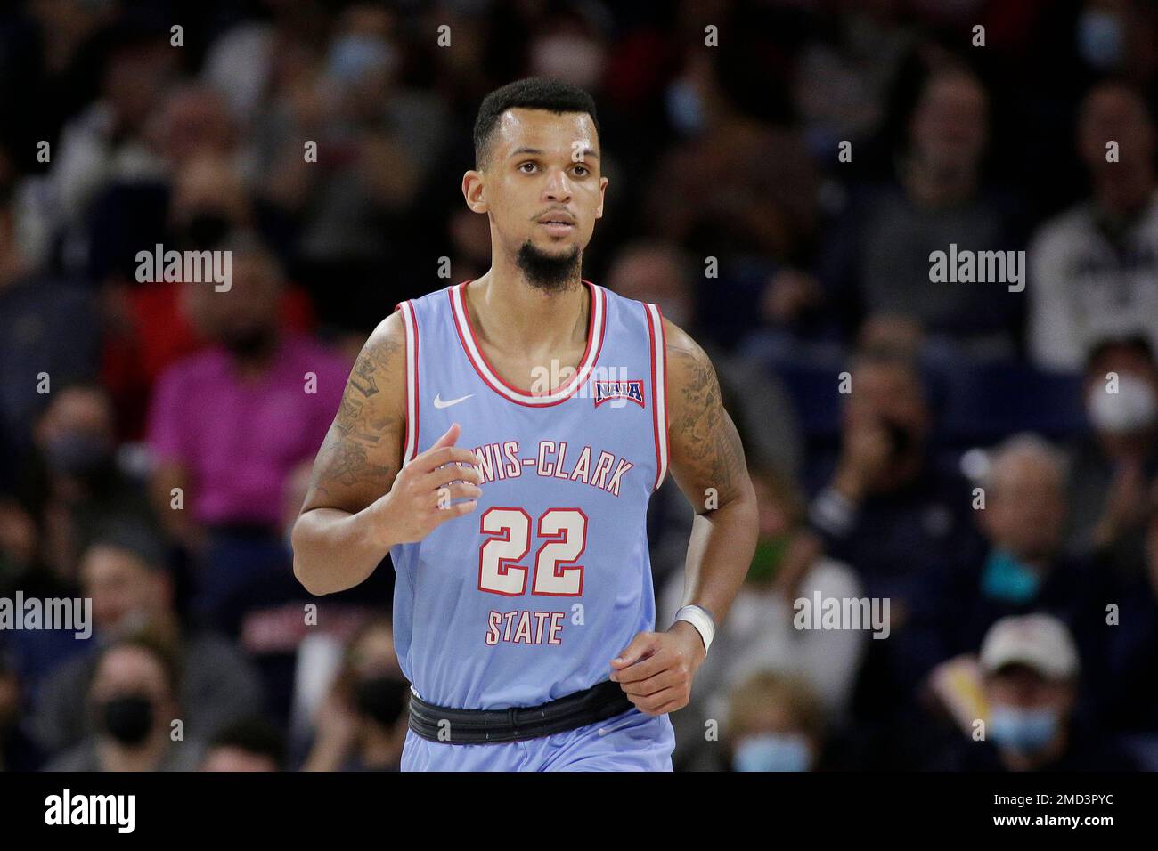 Lewis-Clark State forward Kevin Baker runs up the court during the second  half of a college basketball exhibition game against Gonzaga, Friday, Nov.  5, 2021, in Spokane, Wash. (AP Photo/Young Kwak Stock