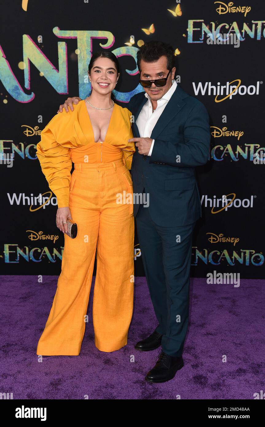 Auli'i Cravalho, left, and John Leguizamo arrive at the premiere of "Encanto" on Wednesday, Nov