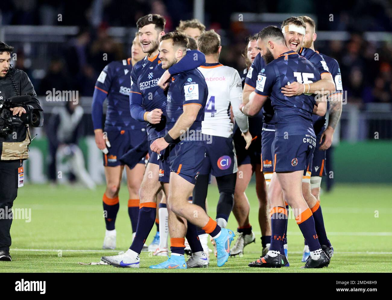 Edinburgh Rugby players celebrate at full time after the Heineken
