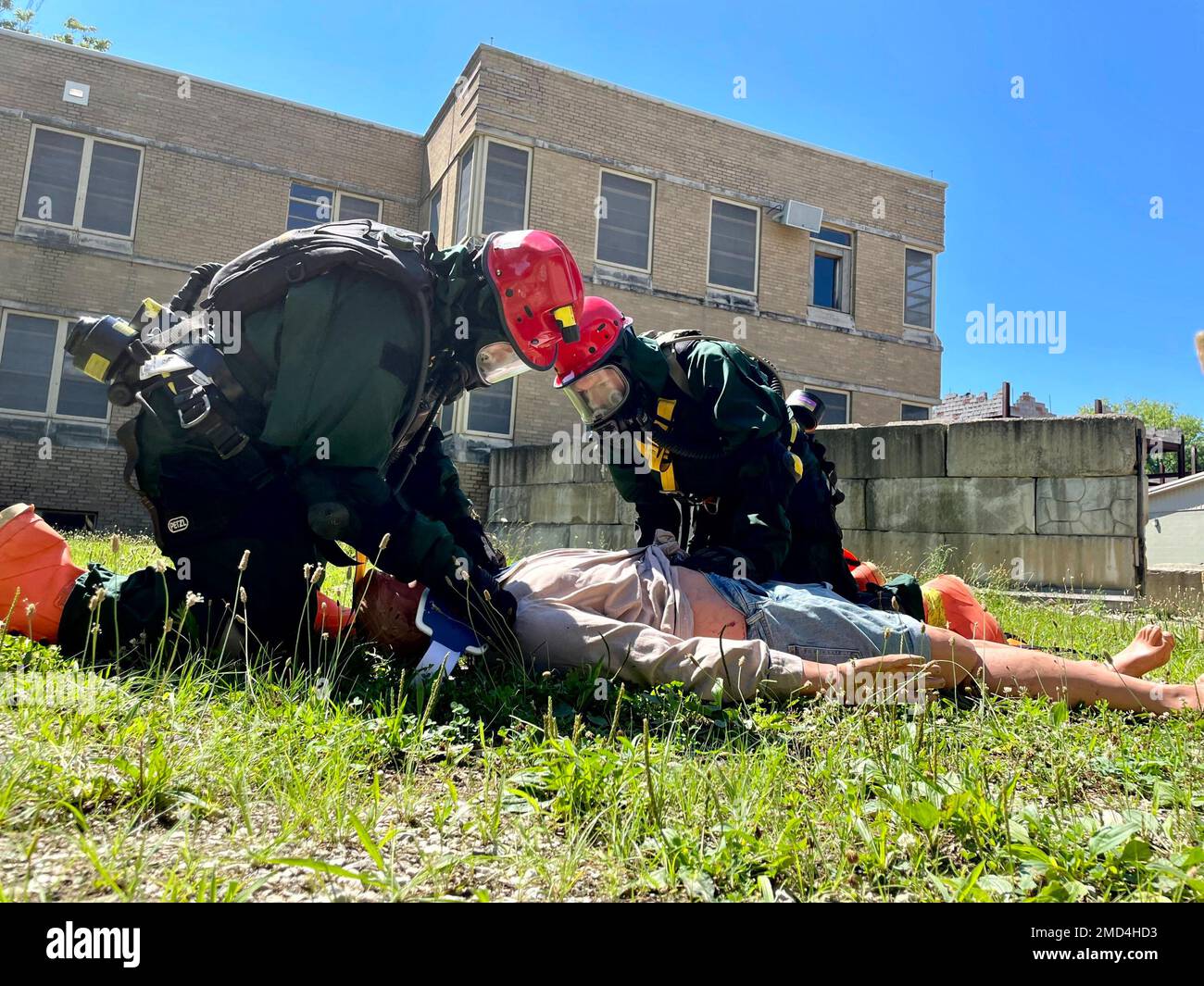 Members of the Ohio National Guard Homeland Response Force’s Chemical, Biological, Radiological, Nuclear Task Force practice conducting search and rescue operations, utilizing a rubber training dummy, during a July 2022 exercise at Muscatatuck Urban Training Center in Butlerville, Ind. Members of the CBRN-TF’s medical element, in conjunction with the search and extraction team, are trained to conduct ropes rescues in full hazmat gear if casualties are trapped in hard-to-reach places, need lifesaving treatment quickly and can’t be evacuated. Stock Photo