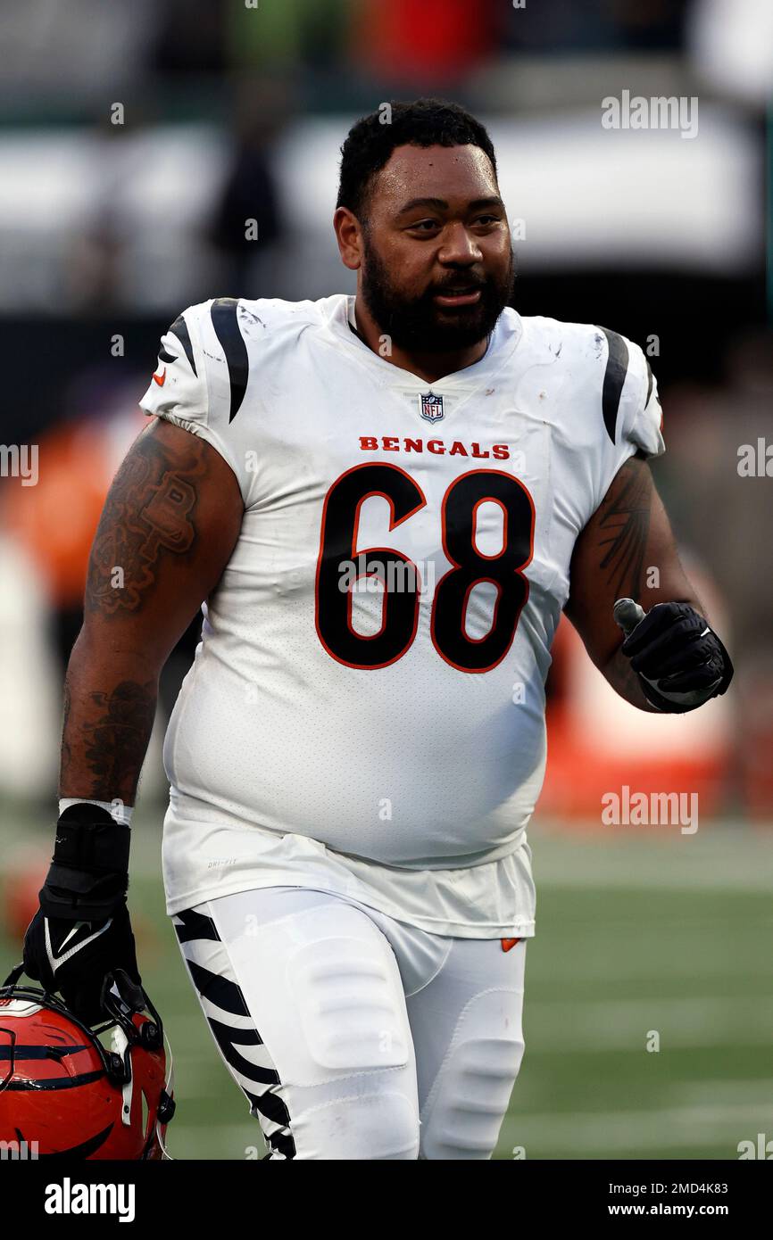 Cincinnati Bengals defensive end Josh Tupou (68) runs off the field after  an NFL football game against the New York Jets, Sunday, Oct. 31, 2021, in  East Rutherford, N.J. (AP Photo/Adam Hunger