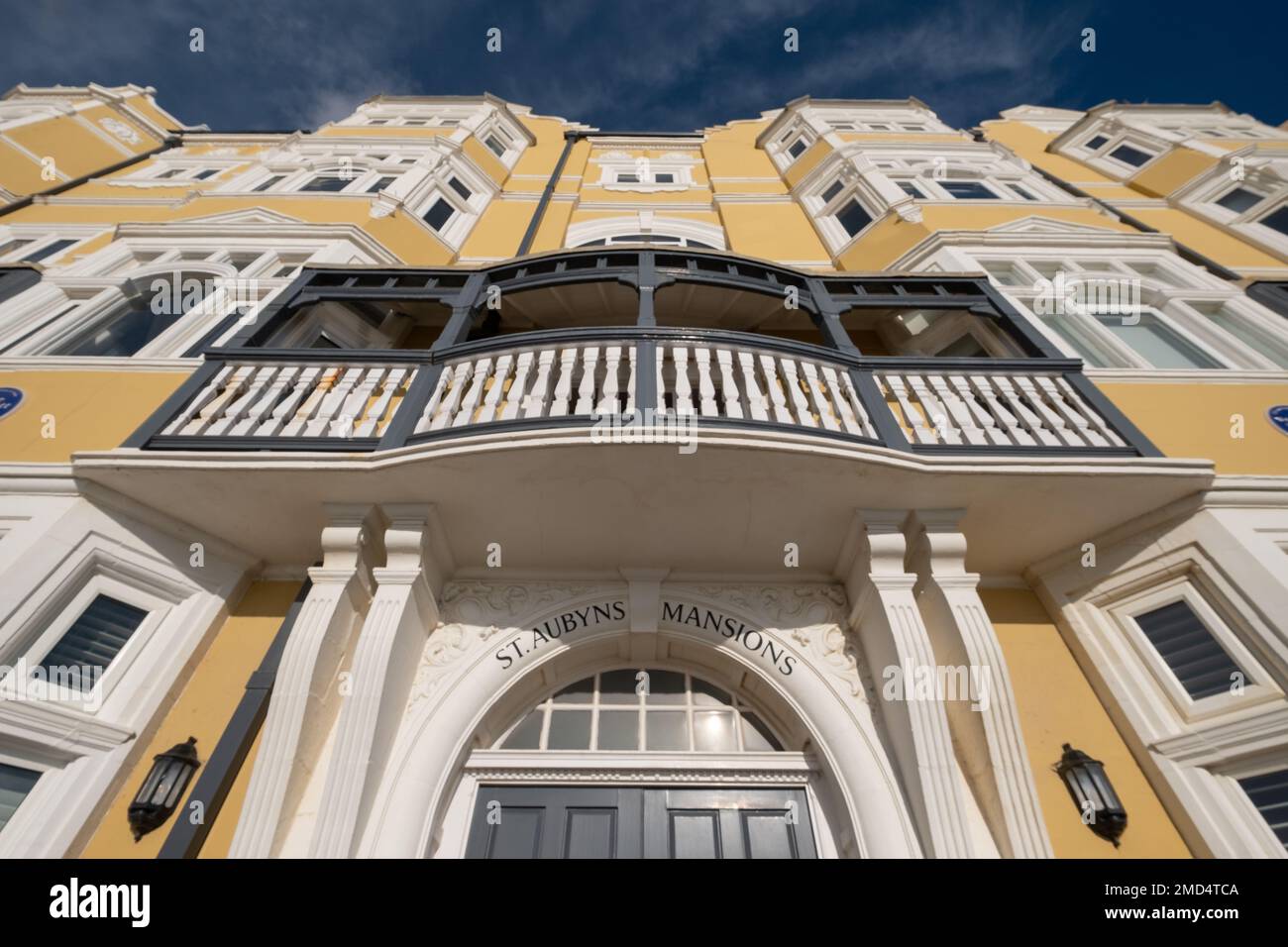 St Aubyns Mansions on Kings Esplanade. Restored mustard coloured block