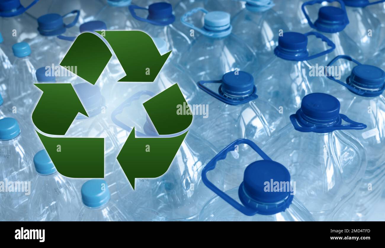 Recycle symbol on a background of plastic bottles Stock Photo