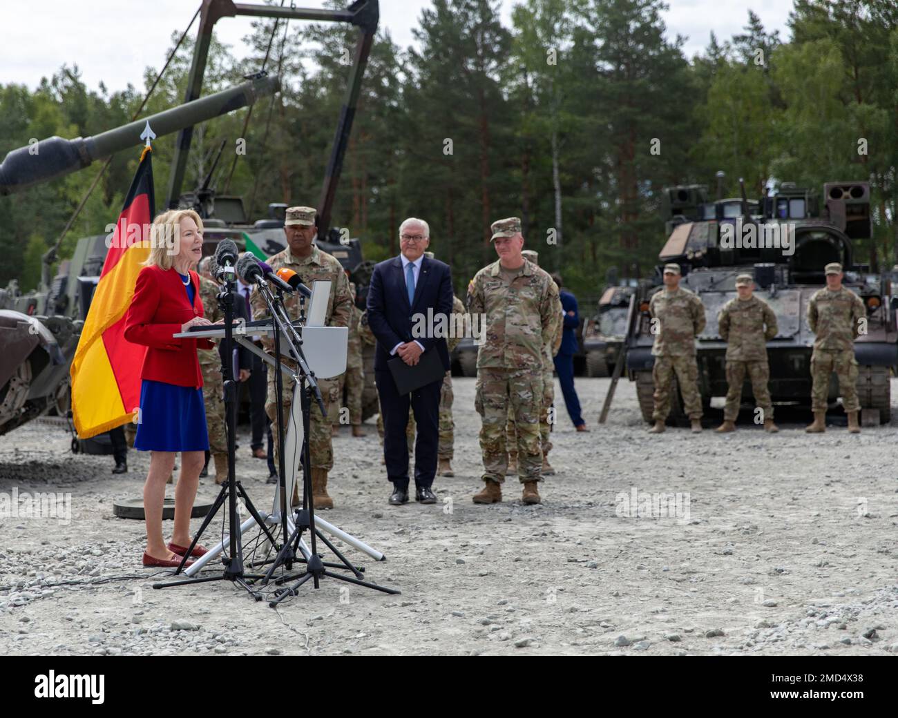 U.S. Ambassador to Germany, Dr. Amy Gutmann, addresses Soldiers of the 3rd Infantry Division's 1st Armor Brigade during her visit to 7th Army Training Command's Grafenwoehr Traiing Area, alongside German President Frank-Walter Steinmeier, July 13, 2022. Ambassador Gutmann traveled to 7 ATC to thank the troops for their contributions to the freedom and security of Germany, NATO, and the historic service they provide to the U.S. and its allies in the european theater. (Army photo by Sgt. Spencer Rhodes, 53rd Infantry Brigade Combat Team) Stock Photo