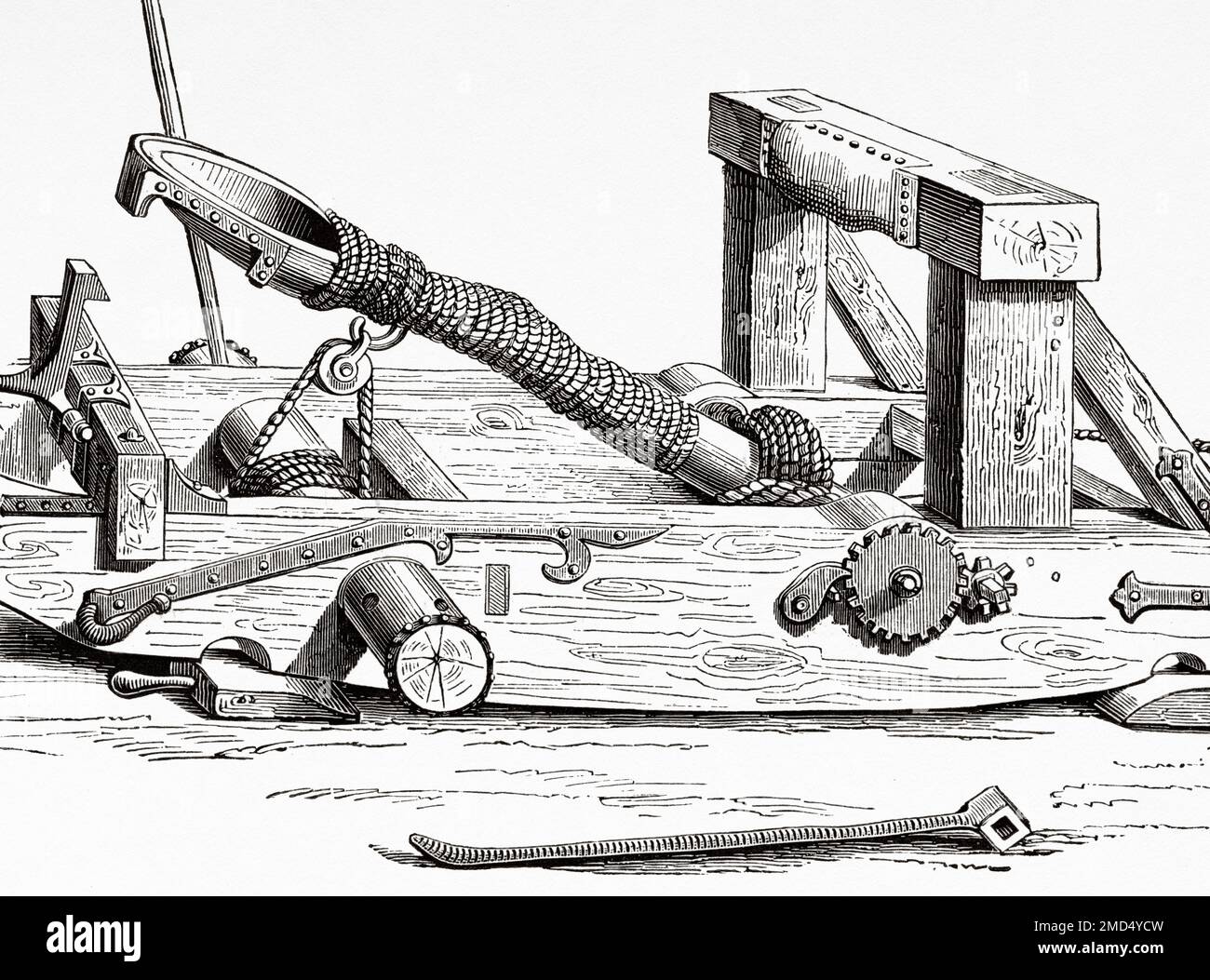 Mangonel, 15th century war machine. Catapult or siege engine used to throw projectiles at the walls of a city or castle. The Arts of the Middle Ages and at the Period of the Renaissance by Paul Lacroix, 1874 Stock Photo