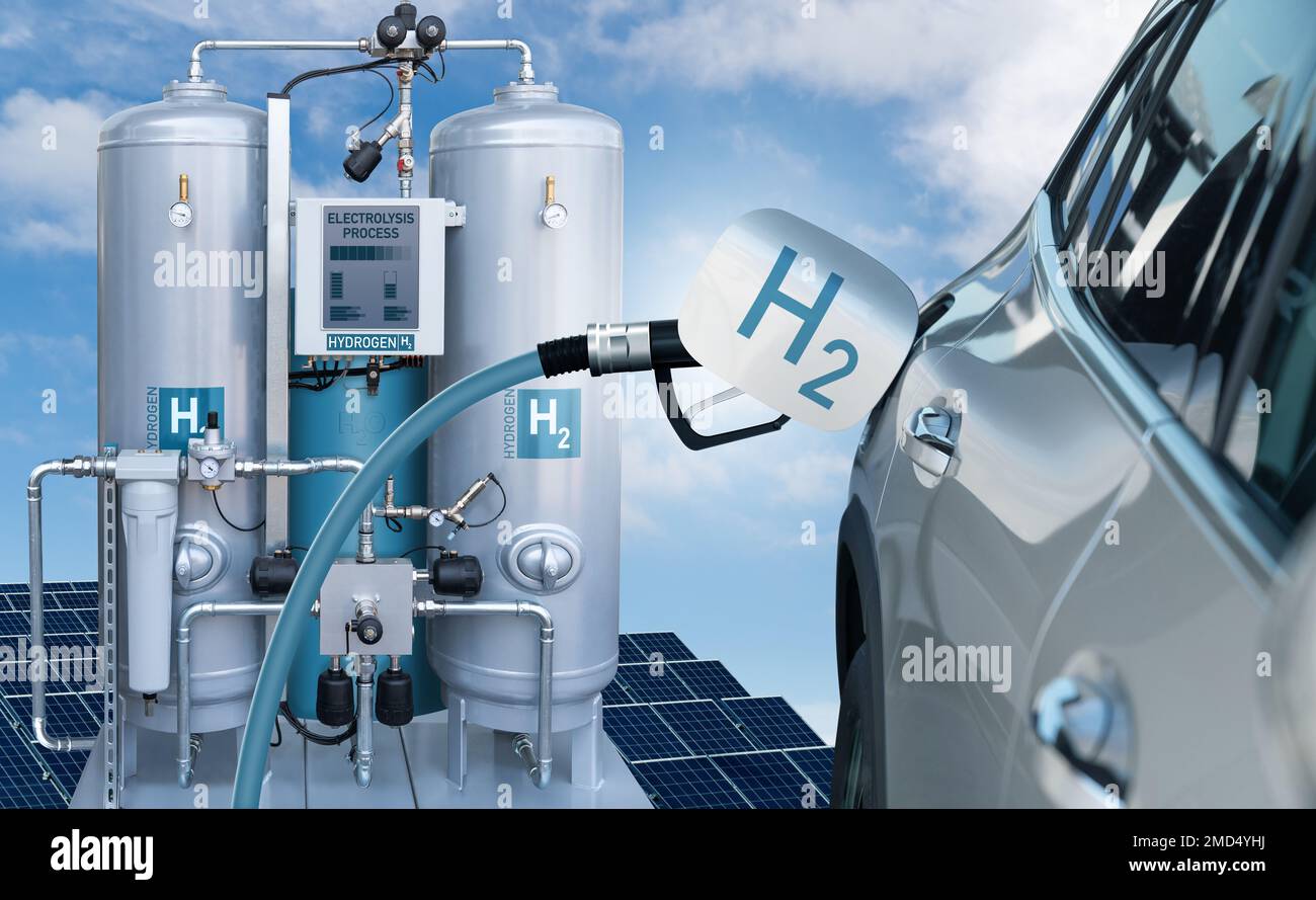 Car with hydrogen fueling nozzle on a background of H2 factory. Hydrogen production from renewable energy sources concept Stock Photo