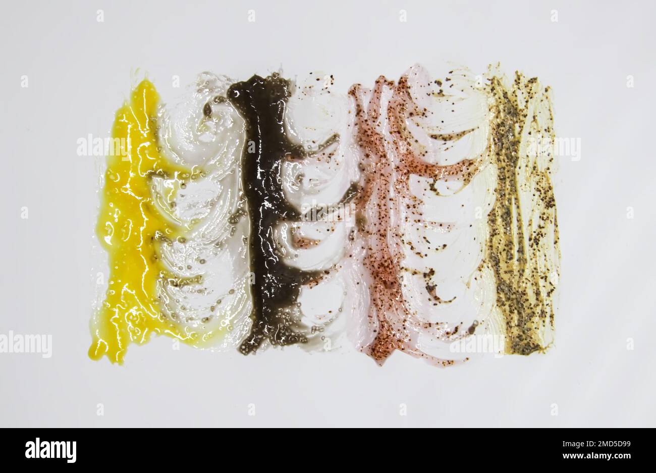 Body scrub textures. Skin care product swatch smear on white background