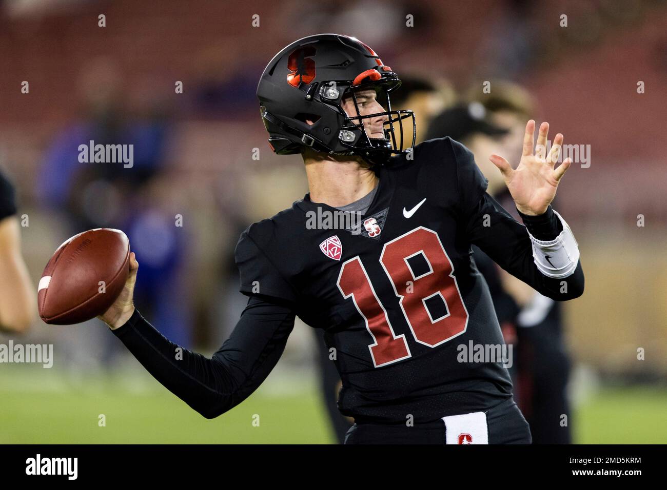 Stanford quarterback Tanner McKee warns up for the team's NCAA college