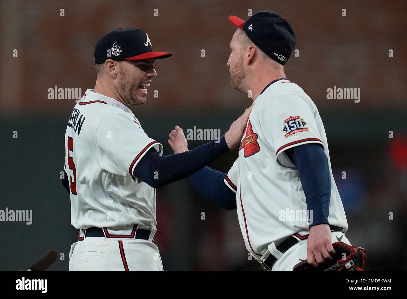 Atlanta Braves relief pitcher Will Smith celebrates with Freddie Freeman  after the last out in Game 4 of baseball's World Series between the Houston  Astros and the Atlanta Braves Sunday, Oct. 31