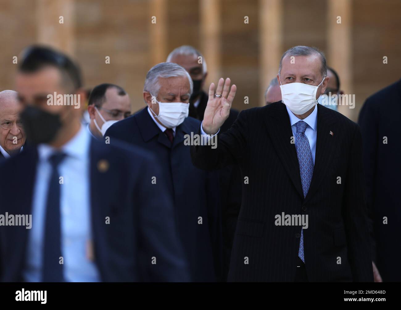 Turkey's President Recep Tayyip Erdogan waves to his supporters as he ...