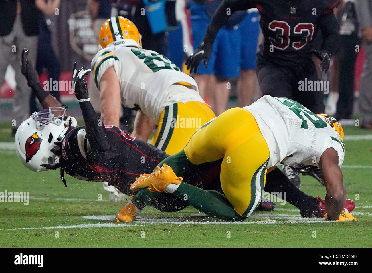 Running back (32) Kylin Hill of the Green Bay Packers warms up before  playing against the