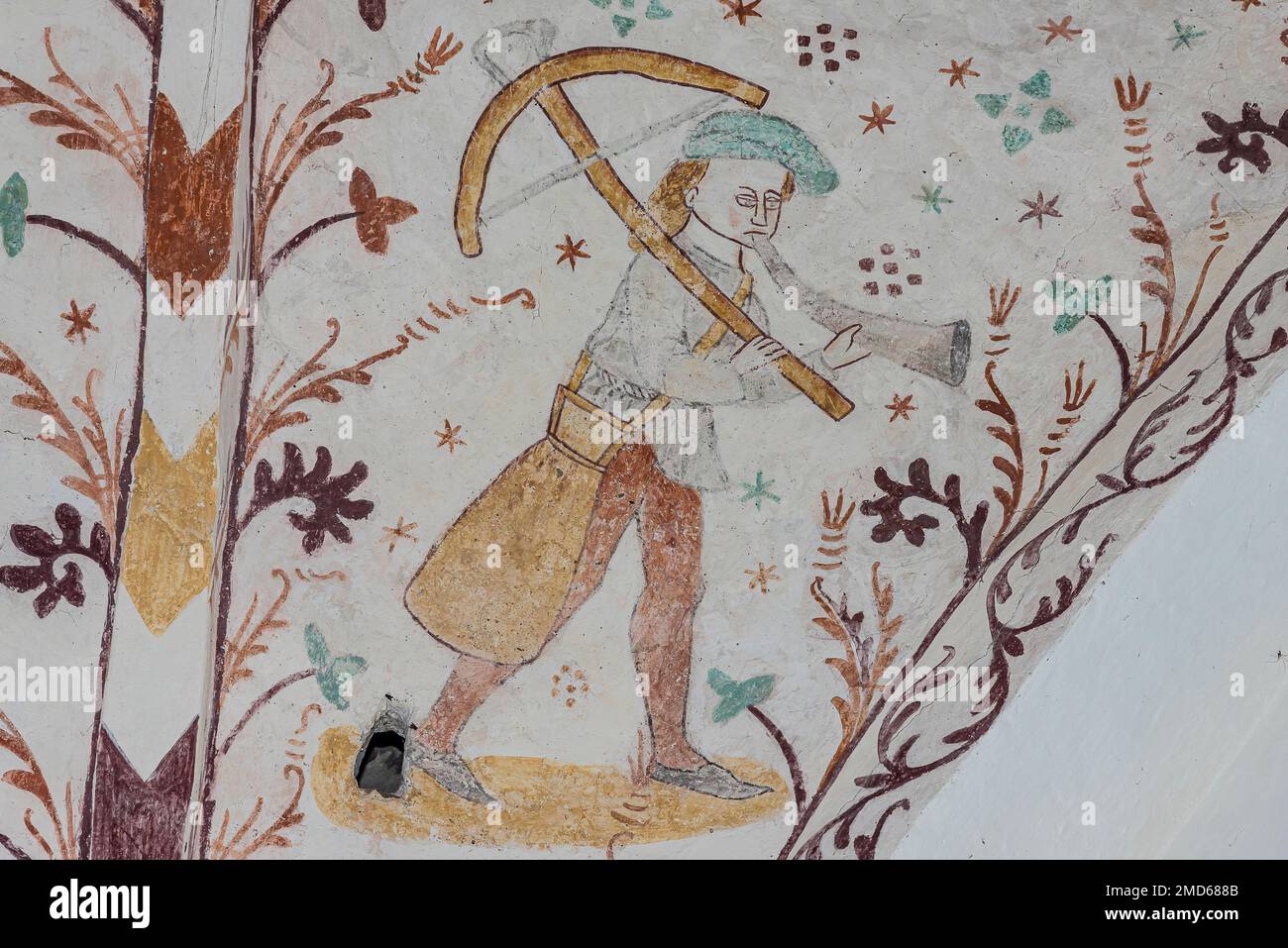 Medieval crossbow at an ancient gothic fresco in Elmelunde church, Denmark, October 10, 2022 Stock Photo