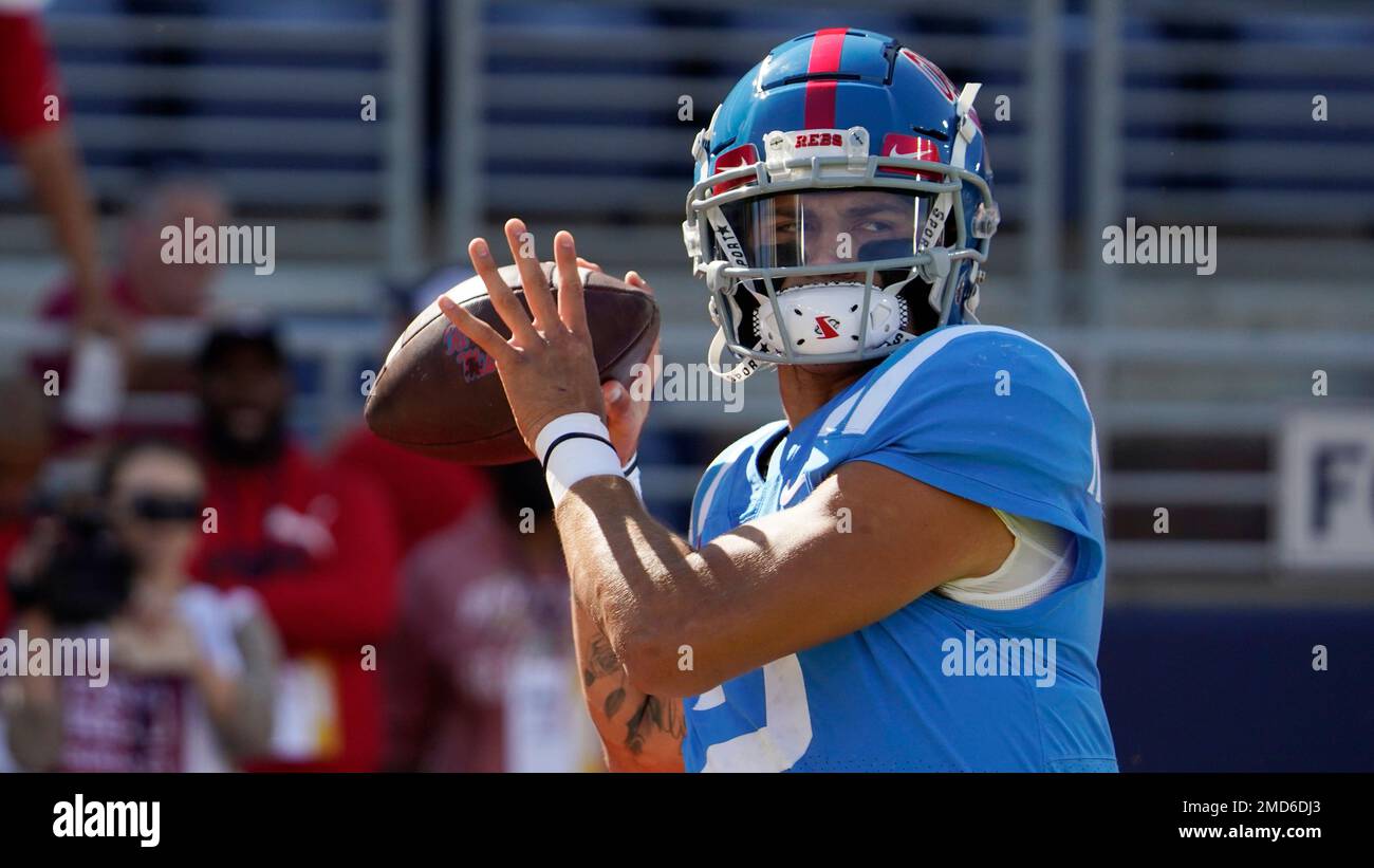 Mississippi quarterback Matt Corral (2) warms up passing during pregame ...