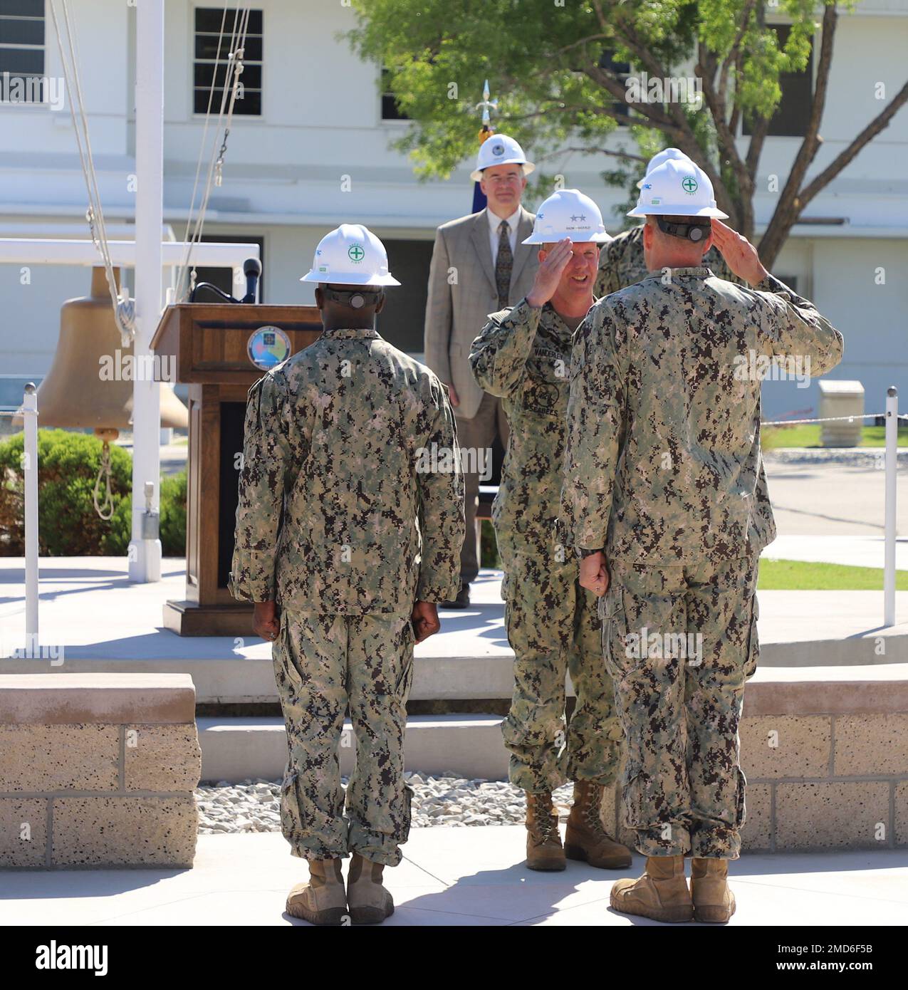 CHINA LAKE) –Cmdr. Ben Wainwright reporting to Rear Adm. Dean VanderLey as commanding officer of OICC China Lake on July 13 aboard Naval Air Weapons Station China Lake. Stock Photo