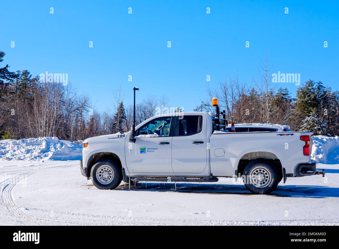 Algonquin Provincial Park, Ontario, Canada - January 14, 2023: An Ontario Parks pickup truck sits in the Algonquin Park Visitor’s Centre parking lot. Stock Photo