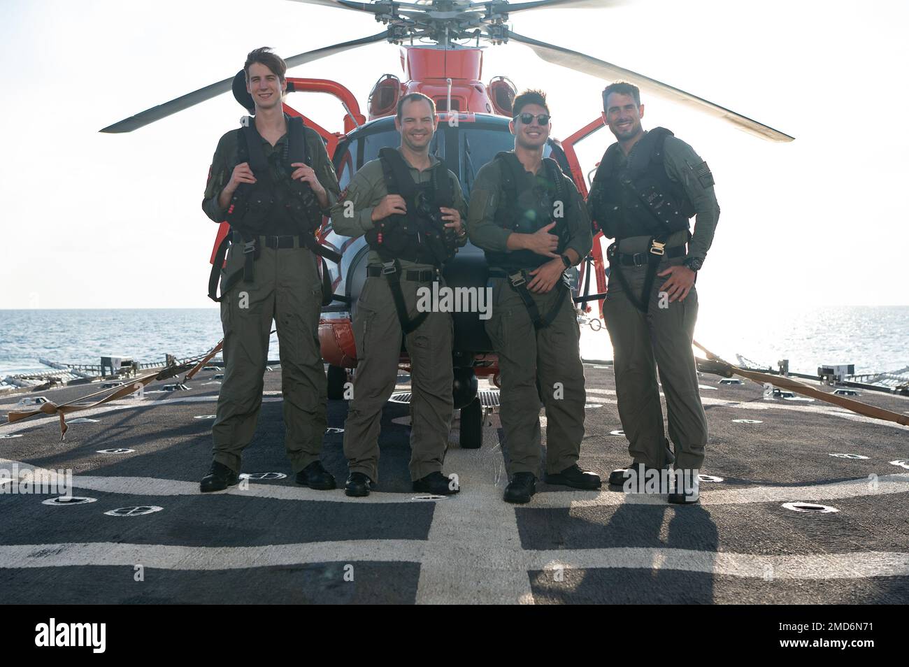 Flight crew members of an U.S. Coast Guard MH65 Dolphin, an asset from