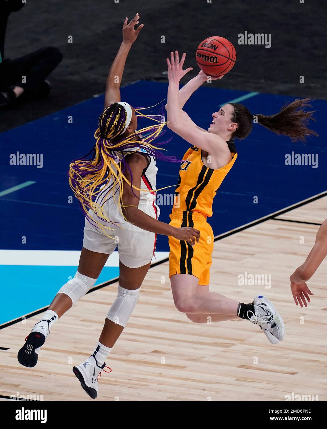 FILE Iowa guard Caitlin Clark (22) drives to the basket against UConn