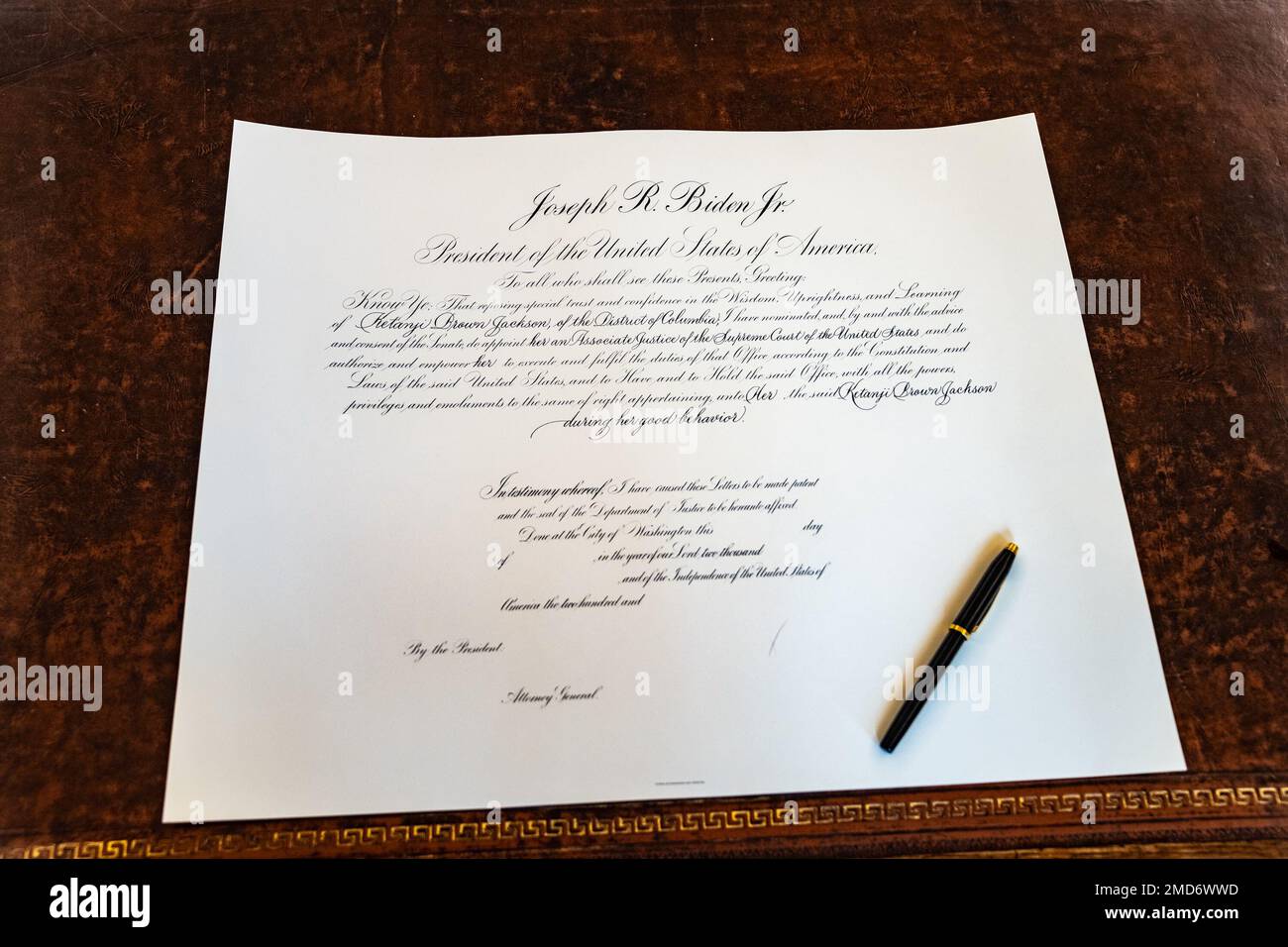 reportage-the-commission-for-supreme-court-justice-ketanji-brown-jackson-waits-on-the-resolute-desk-for-president-joe-bidens-signature-friday-april-8-2022-2MD6WWD.jpg