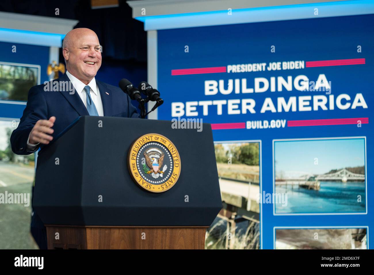 Reportage: Infrastructure Act Implementation Coordinator Mitch Landrieu delivers remarks on on the bipartisan infrastructure law Friday, January 14, 2022, in the South Court Auditorium of the Eisenhower Executive Office Building at the White House Stock Photo