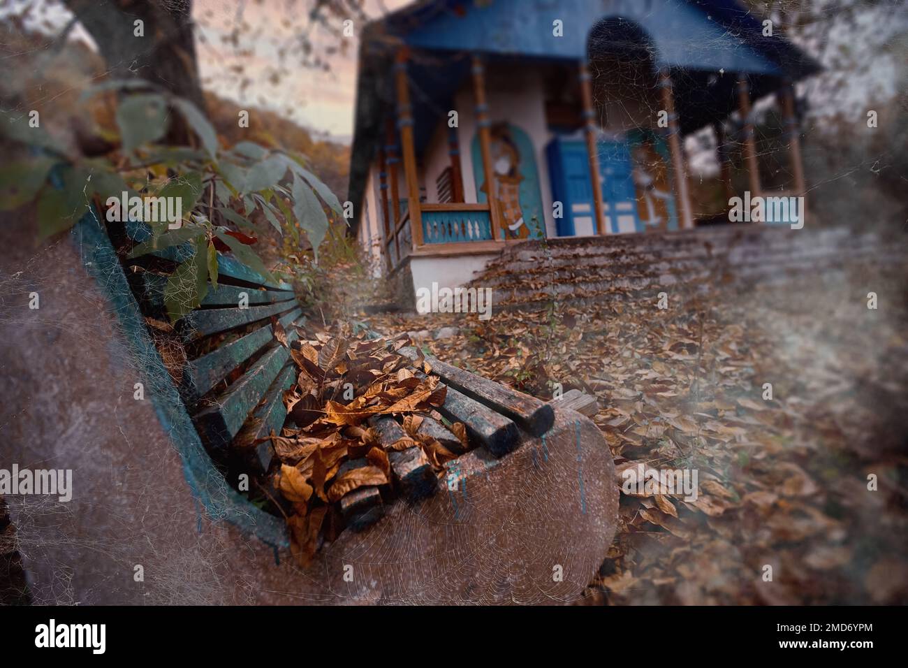 Lost place. Abandoned sanatorium. Cobweb on a bench, autumn fog. Broken house. High quality photo Stock Photo